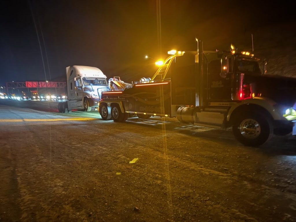 Tow truck providing towing service in Fremont, CA