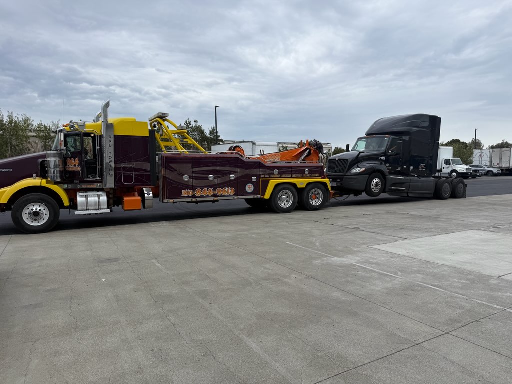 Tow truck towing a vehicle in Union City, CA
